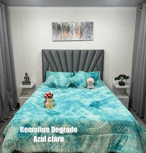 Edredón remolino azul claro